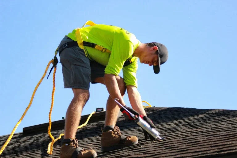 Close up of dark asphalt shingle roofing on a residential roof