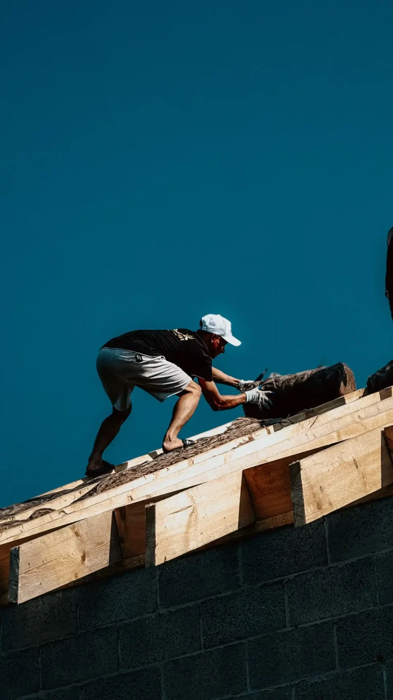 Roofing worker in action on a reroofing project